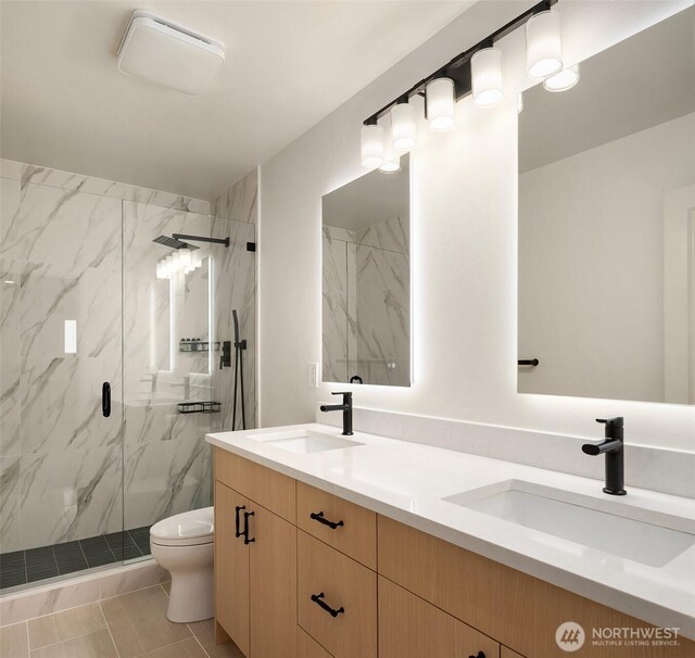 27332 SE 10th Ct, Sammamish, WA 98075 - bathroom with a marble finish shower, toilet, and double vanity