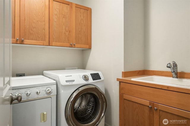 27332 SE 10th Ct, Sammamish, WA 98075 - laundry area with cabinet space and washing machine and clothes dryer