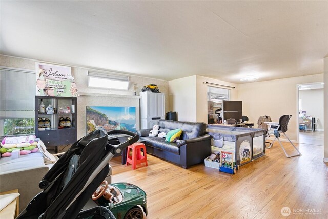 7919 37th Ave S, Seattle, WA 98118 - living area with wood finished floors and plenty of natural light