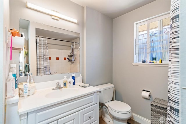 7919 37th Ave S, Seattle, WA 98118 - bathroom with vanity, toilet, and a shower with curtain