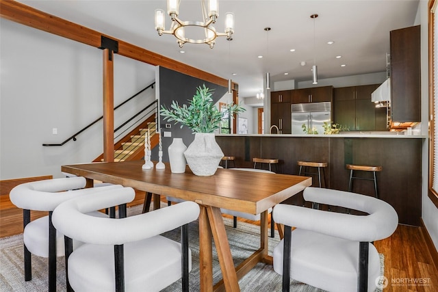 2334 N 57th St, Seattle, WA 98103 - dining room with wood finished floors, recessed lighting, and a chandelier