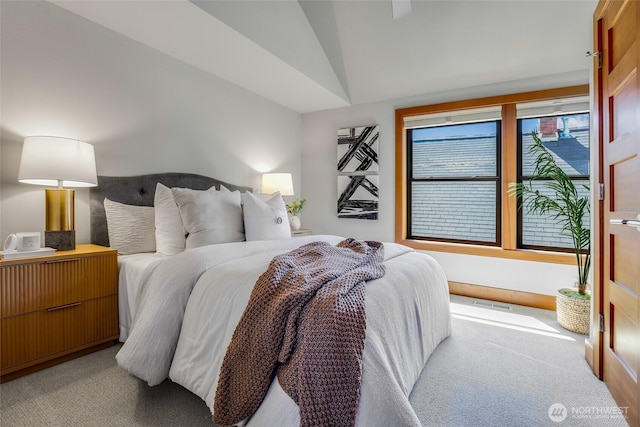 2334 N 57th St, Seattle, WA 98103 - bedroom with light carpet and lofted ceiling