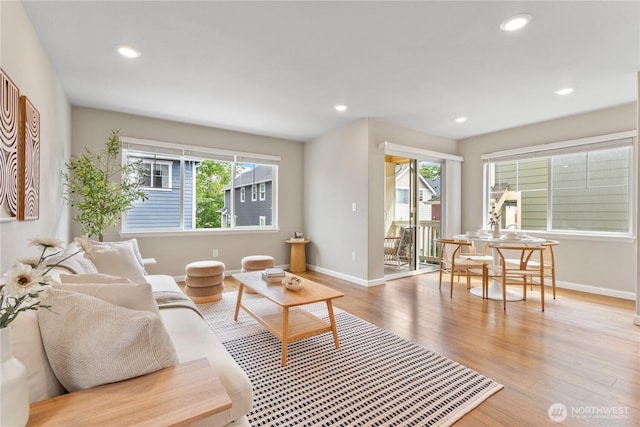 6730 34th Ave SW, Seattle, WA 98126 - living room featuring baseboards, wood finished floors, and recessed lighting