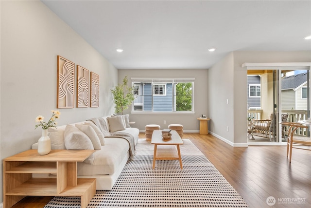 6730 34th Ave SW, Seattle, WA 98126 - living room with wood finished floors, baseboards, and recessed lighting