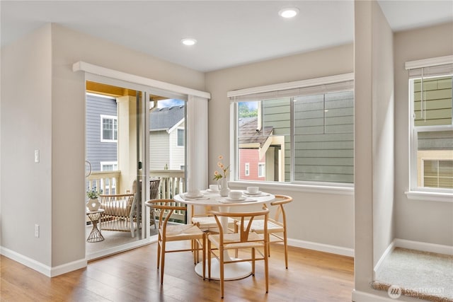 6730 34th Ave SW, Seattle, WA 98126 - dining room with wood finished floors, baseboards, and recessed lighting