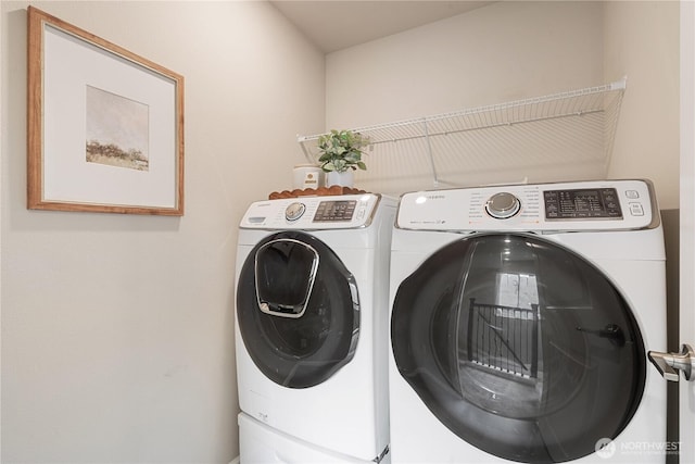 6730 34th Ave SW, Seattle, WA 98126 - washroom featuring separate washer and dryer