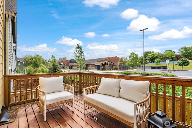 6730 34th Ave SW, Seattle, WA 98126 - wooden terrace featuring an outdoor hangout area and a water view