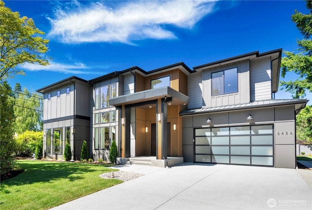 8456 SE 40th St, Mercer Island, WA 98040 - modern home with a standing seam roof, a garage, concrete driveway, a front yard, and metal roof