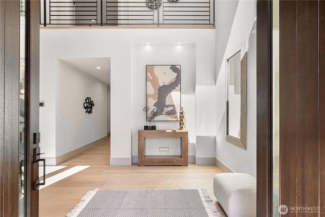 8456 SE 40th St, Mercer Island, WA 98040 - entryway featuring wood finished floors, baseboards, and a high ceiling