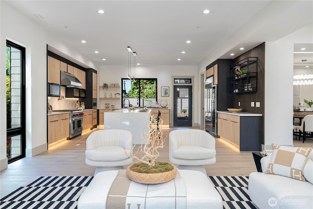 8456 SE 40th St, Mercer Island, WA 98040 - living room with recessed lighting, light wood-type flooring, and baseboards