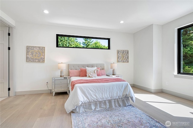 8456 SE 40th St, Mercer Island, WA 98040 - bedroom with light wood-style floors, baseboards, and recessed lighting