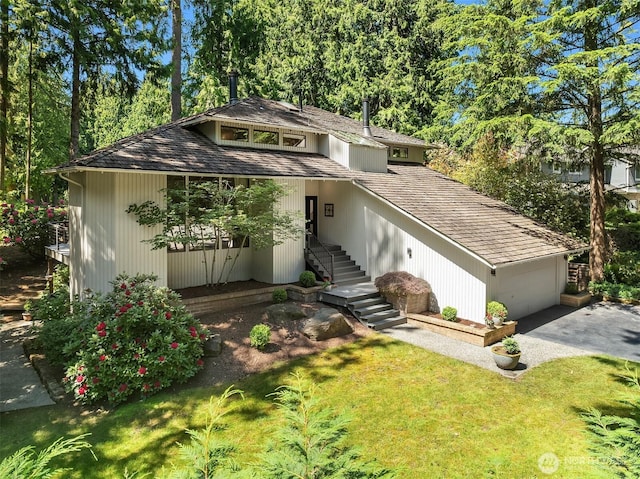 2911 216th Ave NE, Sammamish, WA 98074 - mid-century inspired home featuring driveway, a garage, stairway, and a front yard