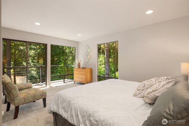 2911 216th Ave NE, Sammamish, WA 98074 - carpeted bedroom featuring multiple windows and recessed lighting