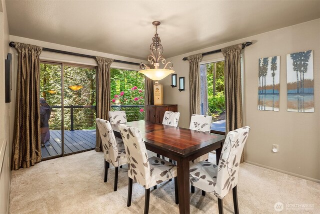 2911 216th Ave NE, Sammamish, WA 98074 - dining area featuring light carpet and baseboards