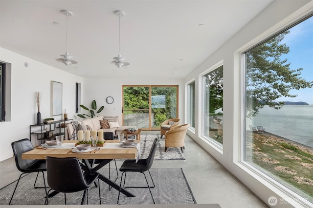 4869 Mercer Rd, Bow, WA 98232 - sunroom featuring concrete flooring and a water view