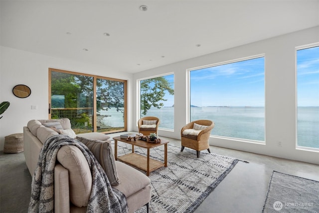 4869 Mercer Rd, Bow, WA 98232 - living area with a water view and carpet floors