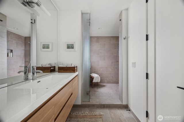 4869 Mercer Rd, Bow, WA 98232 - bathroom with vanity, tile patterned flooring, and tile walls