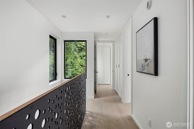 4869 Mercer Rd, Bow, WA 98232 - corridor with light wood-style floors and baseboards