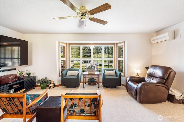 6888 Golf View Dr, Lynden, WA 98264 - living room with a wall unit AC, carpet floors, a ceiling fan, and baseboards