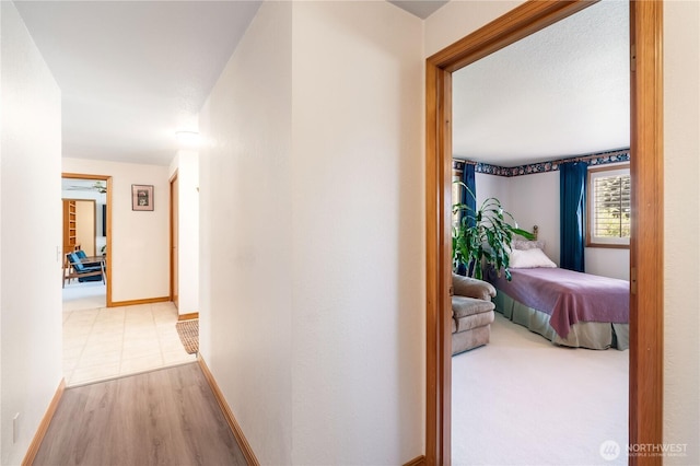 6888 Golf View Dr, Lynden, WA 98264 - hallway featuring baseboards and wood finished floors