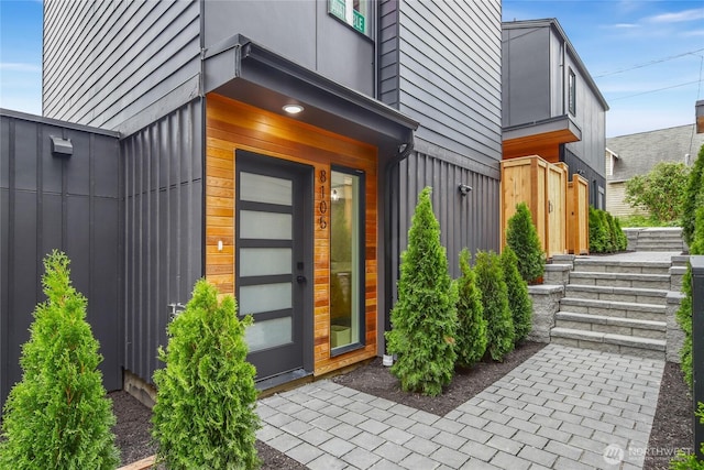 8105B 18th Ave SW, Seattle, WA 98106 - doorway to property featuring board and batten siding