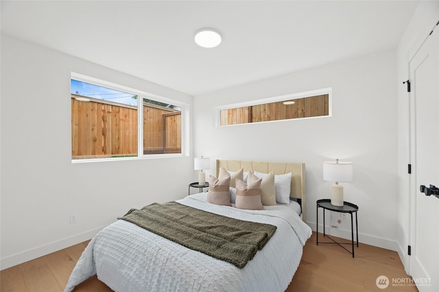8105B 18th Ave SW, Seattle, WA 98106 - bedroom with wood finished floors and baseboards