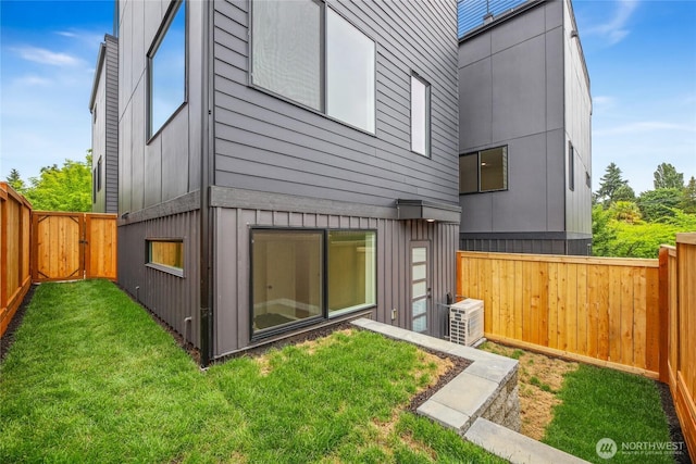 8105B 18th Ave SW, Seattle, WA 98106 - back of house with ac unit and a gate