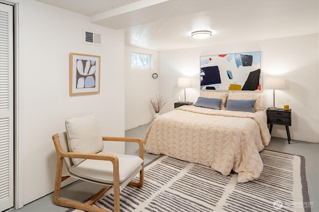 4828 38th Ave NE, Seattle, WA 98105 - bedroom featuring a closet and concrete flooring