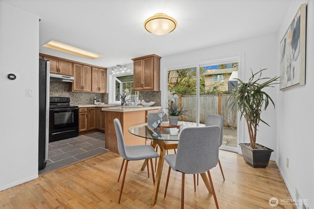 325 NE 178th St, Shoreline, WA 98155 - dining area with wood finished floors and baseboards