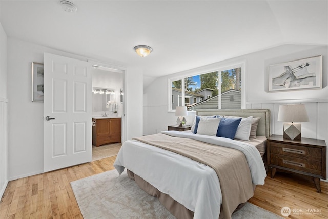 325 NE 178th St, Shoreline, WA 98155 - bedroom featuring light wood-style flooring, lofted ceiling, and ensuite bathroom