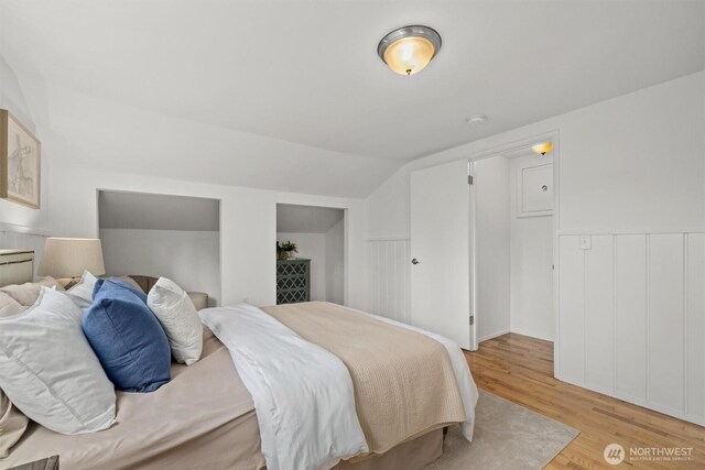 325 NE 178th St, Shoreline, WA 98155 - bedroom featuring light wood-type flooring and vaulted ceiling
