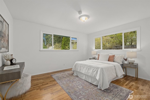 325 NE 178th St, Shoreline, WA 98155 - bedroom featuring light wood-type flooring and baseboards