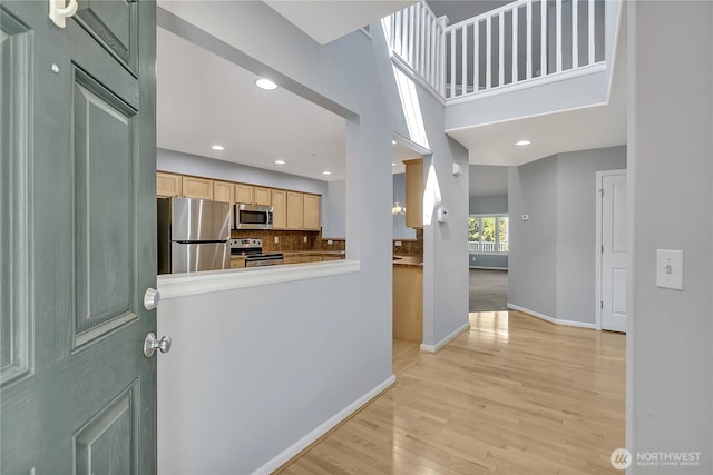 5909 Panorama Dr SE Unit 6-103, Auburn, WA 98092 - foyer with light wood-style floors, baseboards, and recessed lighting