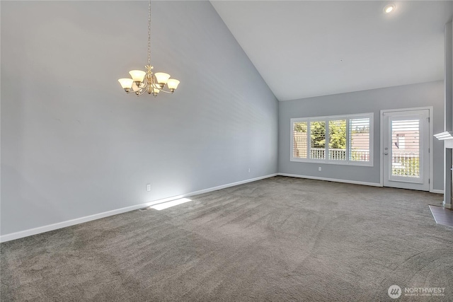 5909 Panorama Dr SE Unit 6-103, Auburn, WA 98092 - unfurnished room featuring a chandelier, baseboards, high vaulted ceiling, and dark carpet