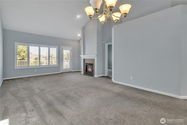 5909 Panorama Dr SE Unit 6-103, Auburn, WA 98092 - unfurnished living room featuring a chandelier, carpet flooring, baseboards, a tile fireplace, and high vaulted ceiling