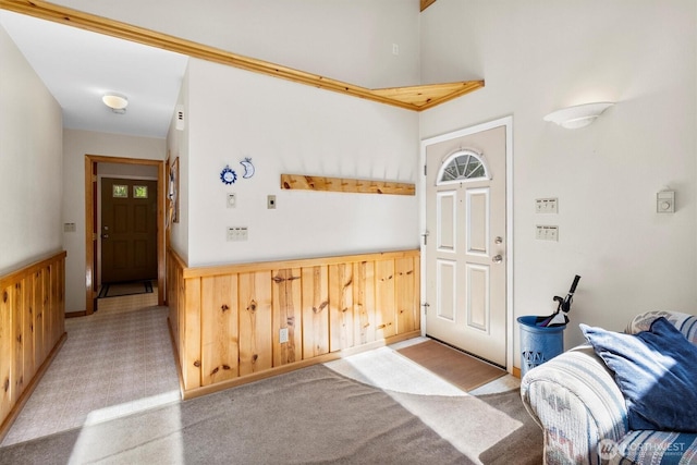 7101 Rainier Way, Glacier, WA 98244 - foyer entrance with wainscoting, light colored carpet, and wooden walls