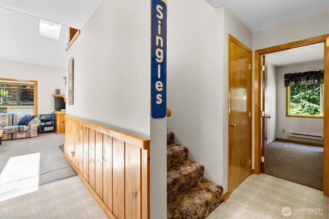 7101 Rainier Way, Glacier, WA 98244 - staircase featuring carpet flooring and a baseboard radiator