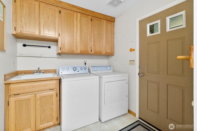 7101 Rainier Way, Glacier, WA 98244 - washroom with cabinet space, washer and dryer, light flooring, and baseboards
