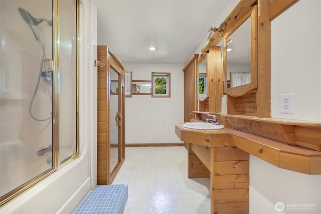 3542 Constitution Rd, Lummi Island, WA 98262 - full bathroom featuring tile patterned floors, vanity, baseboards, and recessed lighting