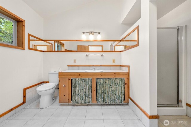 3542 Constitution Rd, Lummi Island, WA 98262 - full bathroom featuring toilet, a shower stall, vaulted ceiling, vanity, and tile patterned floors
