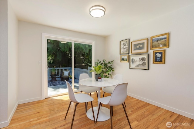 19802 33rd Dr SE, Bothell, WA 98012 - dining room with light wood-style floors and baseboards