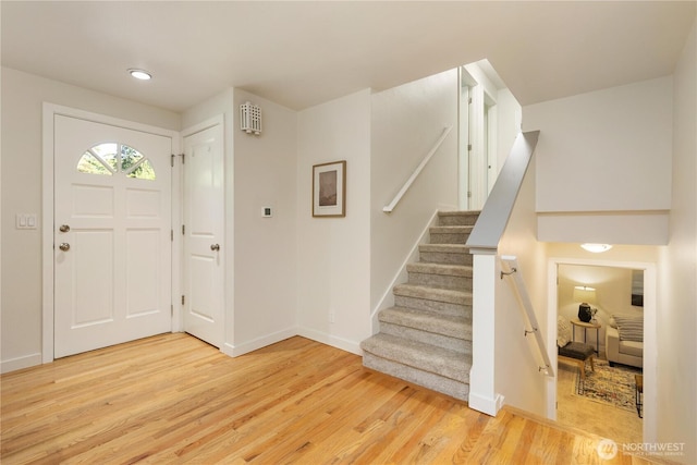 19802 33rd Dr SE, Bothell, WA 98012 - entrance foyer featuring light wood-type flooring, baseboards, stairs, and recessed lighting