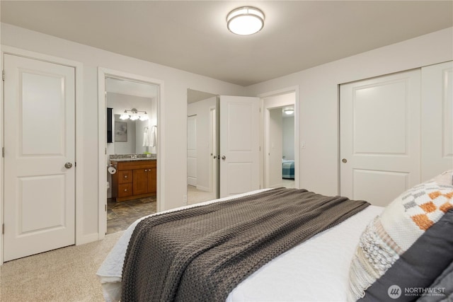 19802 33rd Dr SE, Bothell, WA 98012 - bedroom featuring a closet, ensuite bathroom, carpet floors, and baseboards