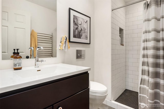 2043 N 78th St, Seattle, WA 98103 - bathroom with vanity, tiled shower, and toilet