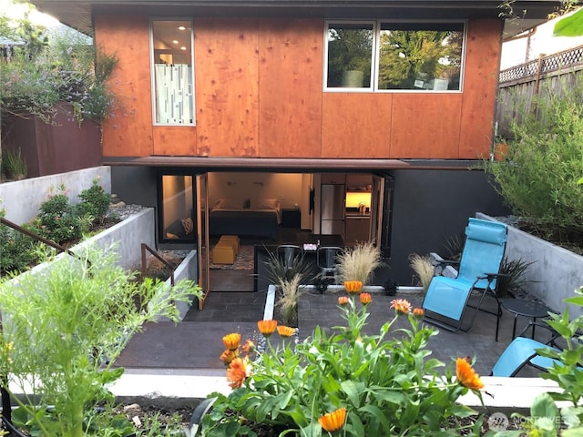 2043 N 78th St, Seattle, WA 98103 - back of house featuring a patio and stucco siding