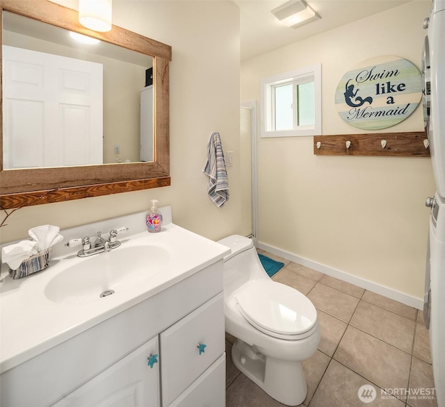 24410 Vashon Hwy SW, Vashon, WA 98070 - bathroom with vanity, toilet, baseboards, and tile patterned floors