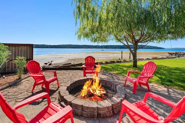 24410 Vashon Hwy SW, Vashon, WA 98070 - view of patio featuring a fire pit and a water view