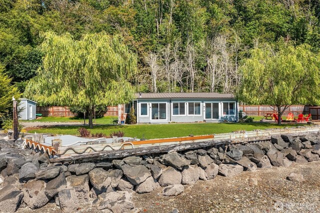 24410 Vashon Hwy SW, Vashon, WA 98070 - view of front of property featuring a forest view and metal roof