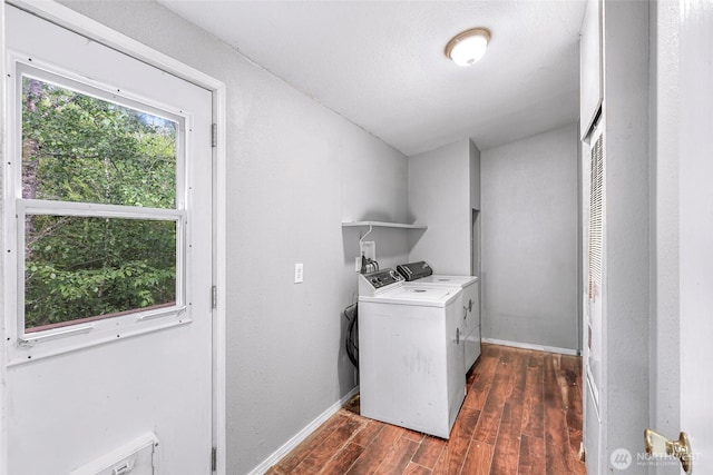 4949 Samish Way Unit 17, Bellingham, WA 98229 - laundry room featuring washing machine and clothes dryer, dark wood-style flooring, and baseboards