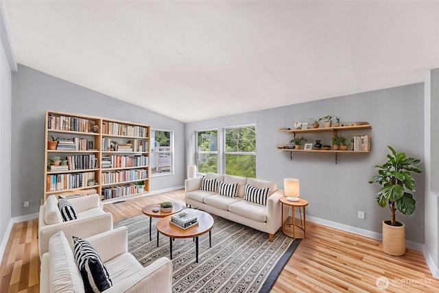 4949 Samish Way Unit 17, Bellingham, WA 98229 - living room featuring wood finished floors, lofted ceiling, and baseboards